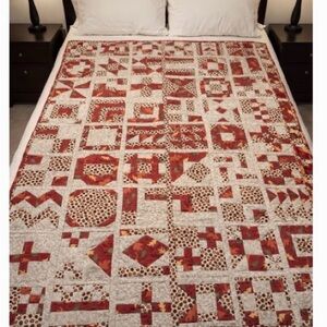 New homemade Patchwork Quilt with browns , creams , reds , oranges etc